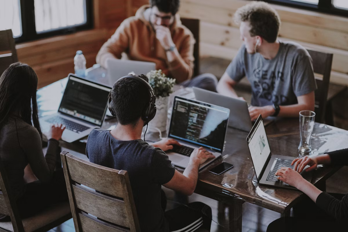 A small team working through a problem together
