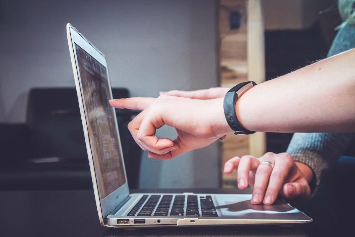 Late-night build session lit by a laptop screen